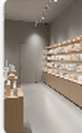 A quiet documentary Korean beauty retail scene with curated shelving, warm editorial light, and clear separation from the main retail hero.